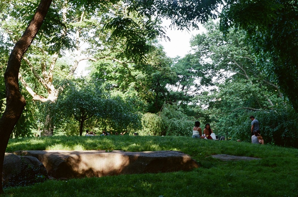a pair of cell phones on a concrete block