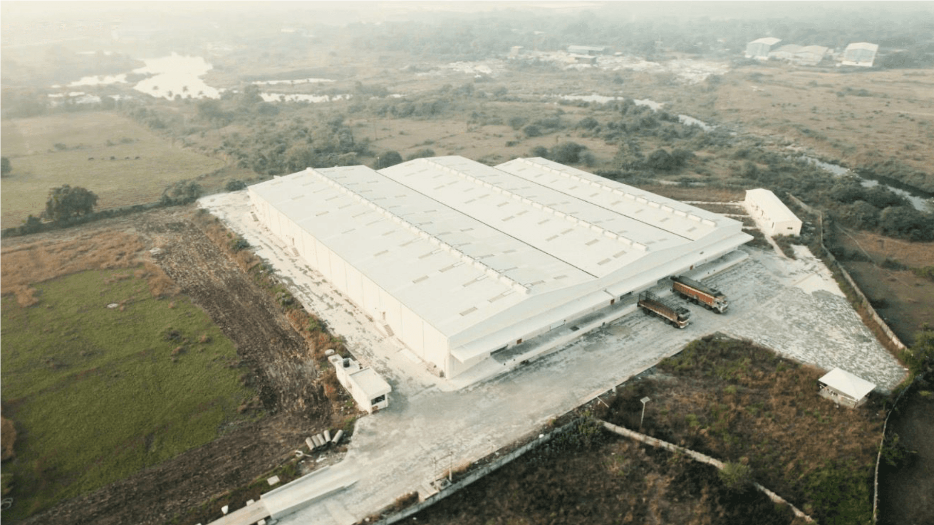 Aerial view of Alpenol’s textile chemical manufacturing facility in Sanjan, Gujarat, producing sustainable compound sizing solutions for weaving mills.