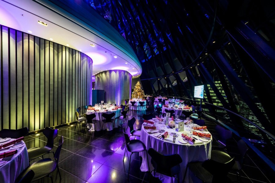 Guests dancing under warm lighting at a Muskoka wedding reception.