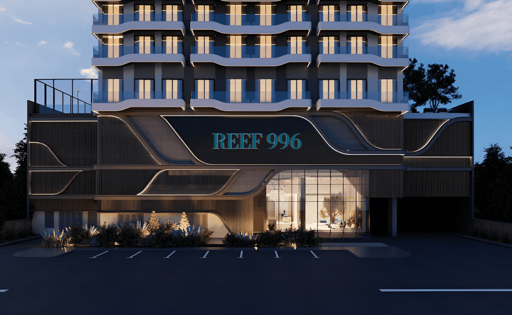 Aerial view of Reef 996 in Dubai, showcasing its modern architecture and surrounding urban landscape.