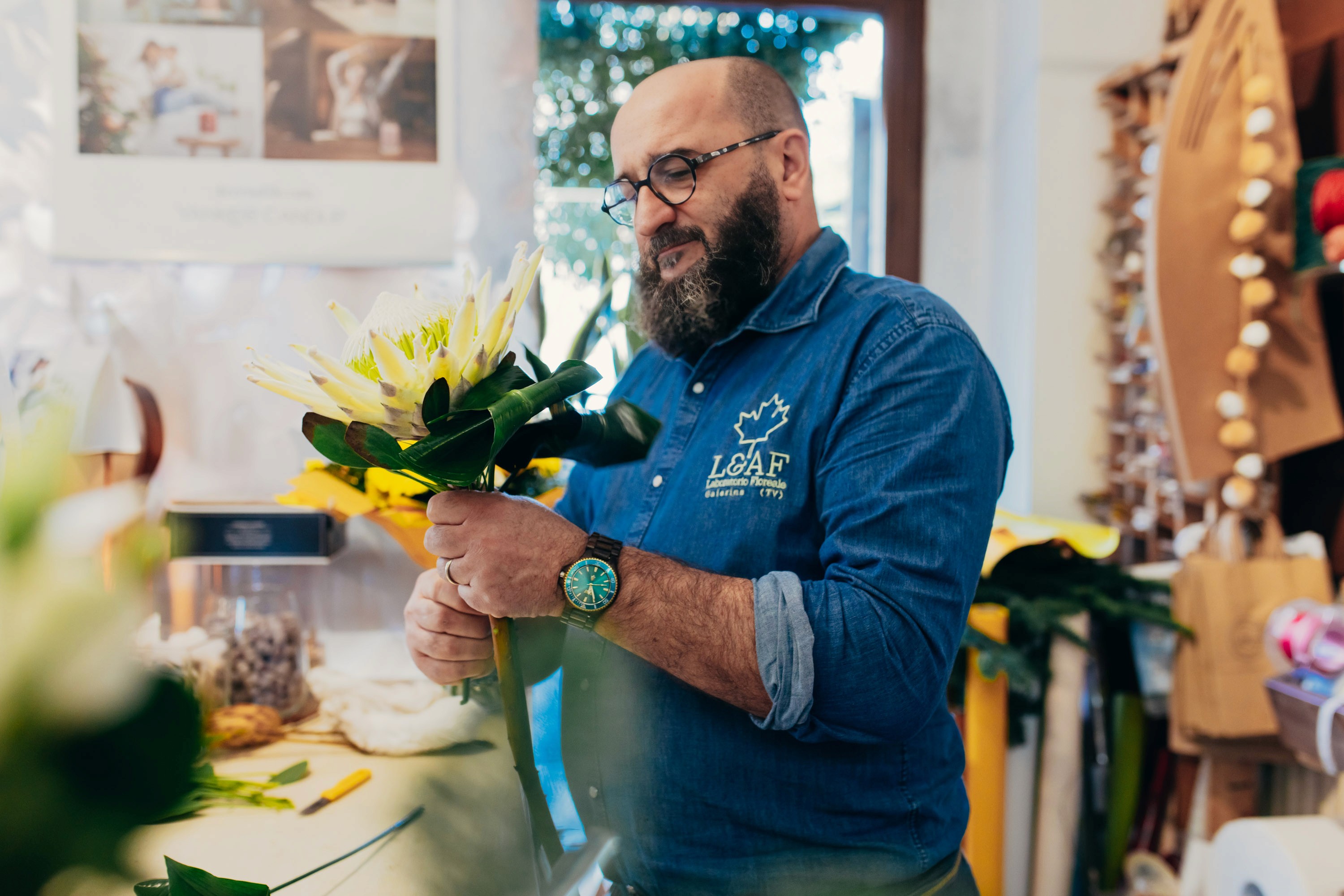 Andrea creating a flower composition