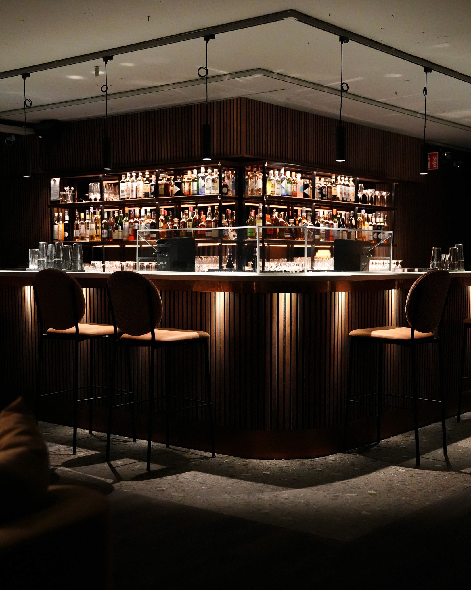 green and brown rock formation on blue sea during daytime
