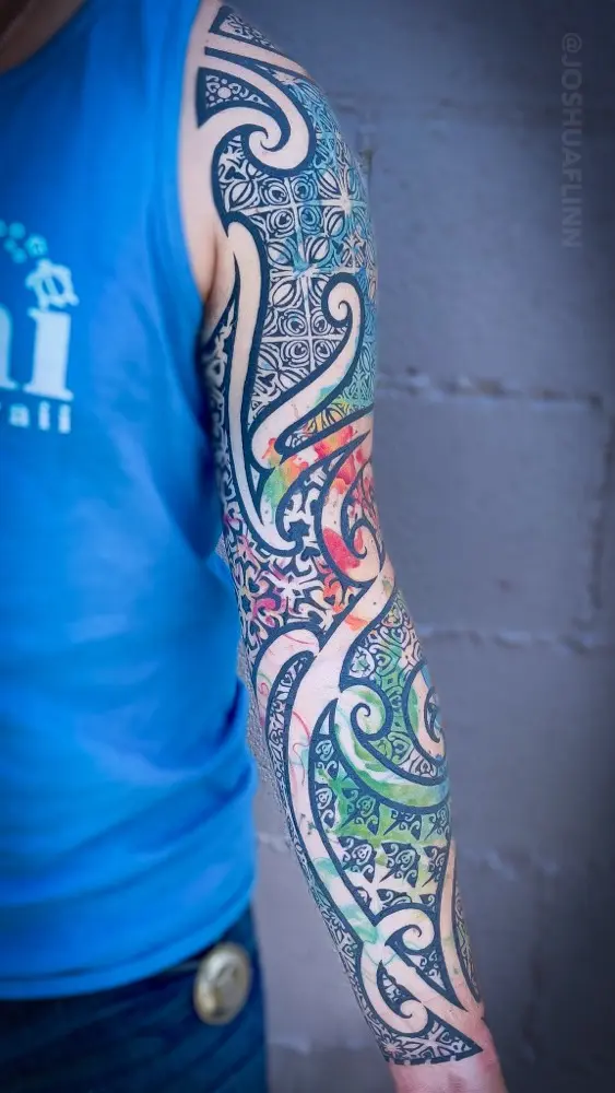 geometric polynesian watercolor arm sleeve tattoo