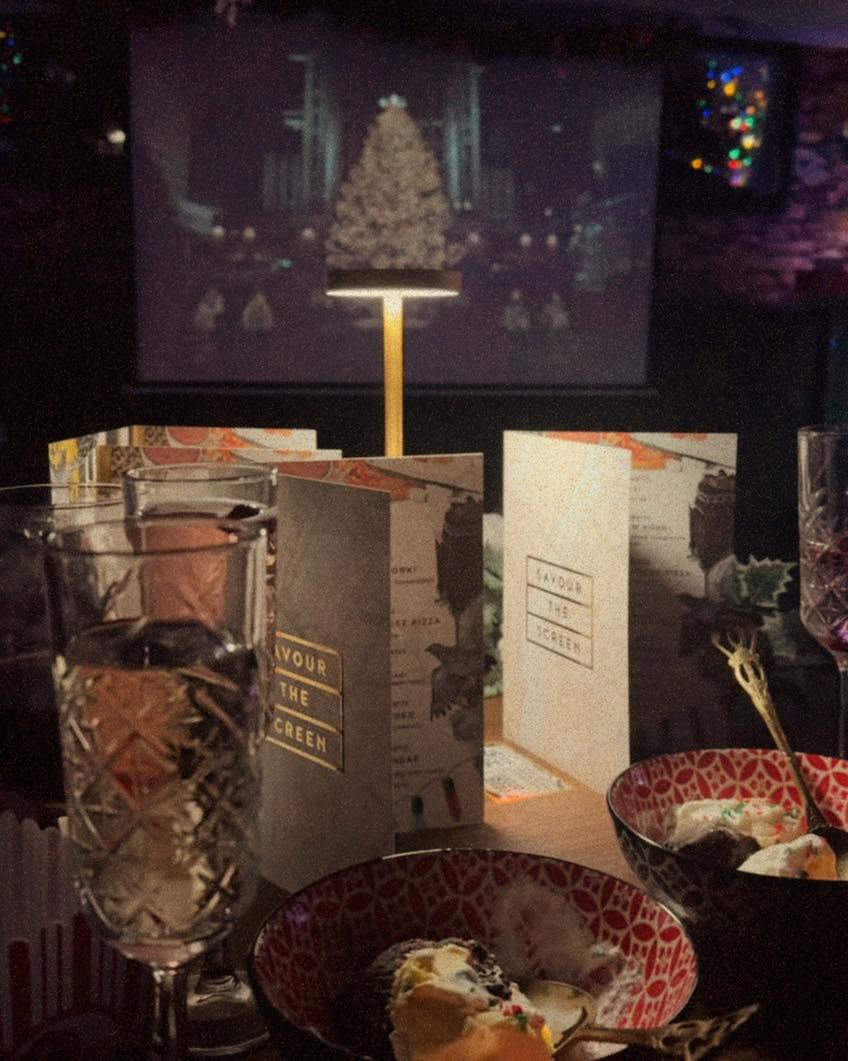 turned on LED projector on table