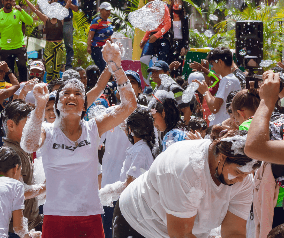 man drawing on dry-erase board