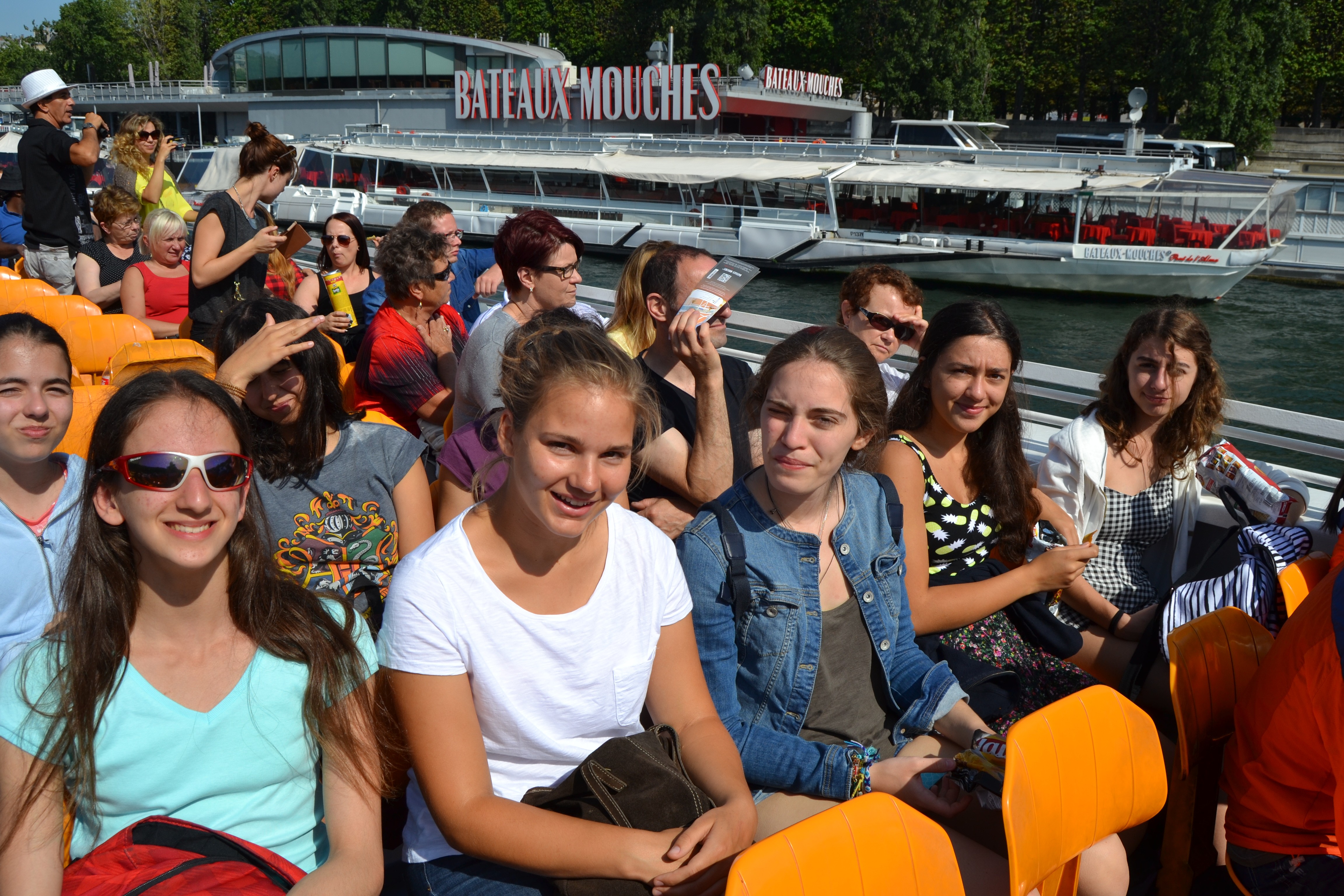 a group of people standing on a dock