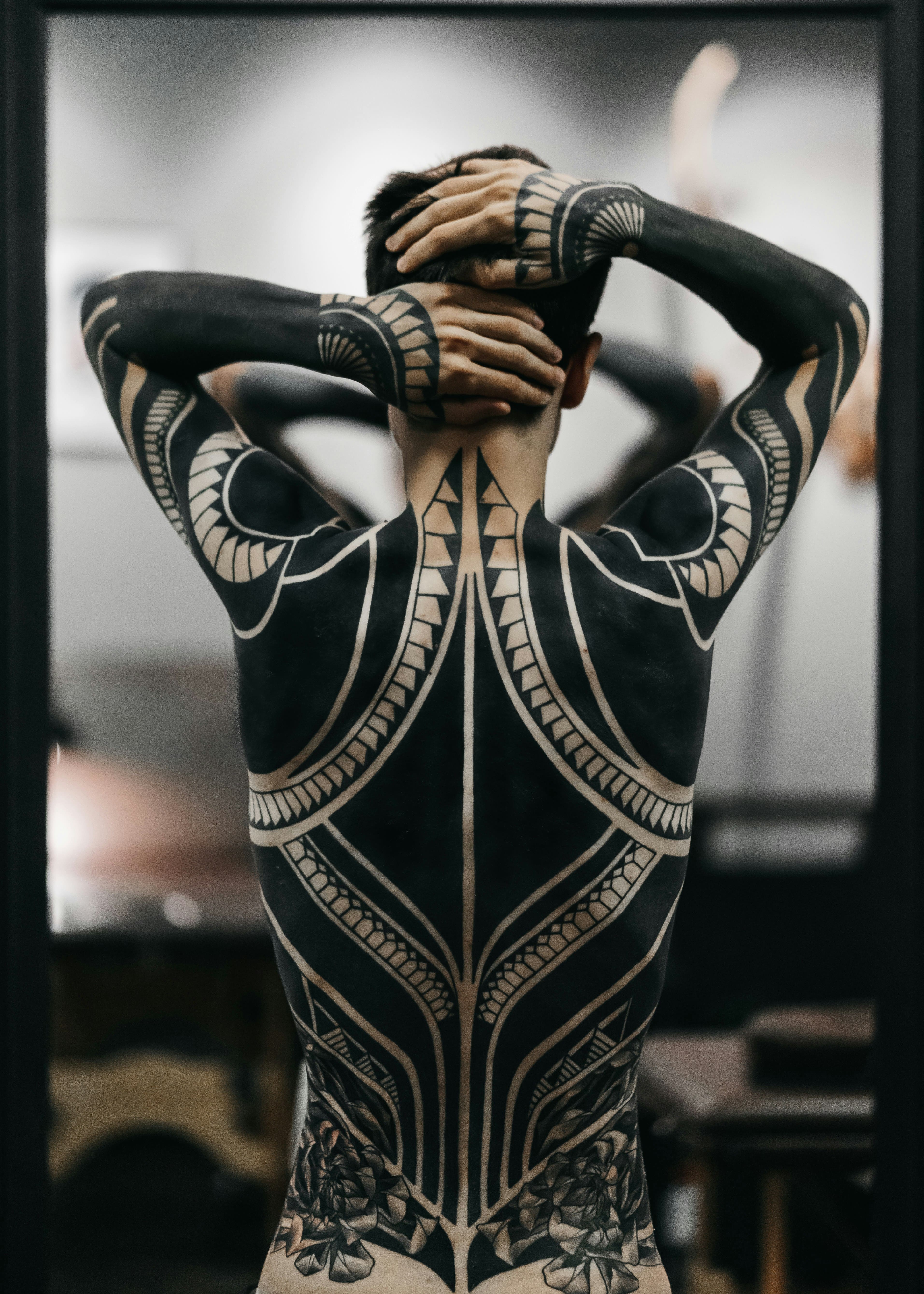 Full back tribal black tattoo