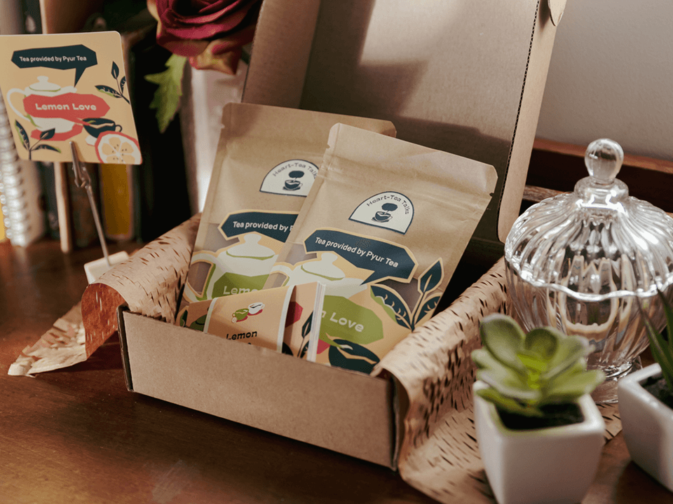 Product photo of the Heart-Tea Talks kit, showing the packaged box with tea sachets and conversation cards.
