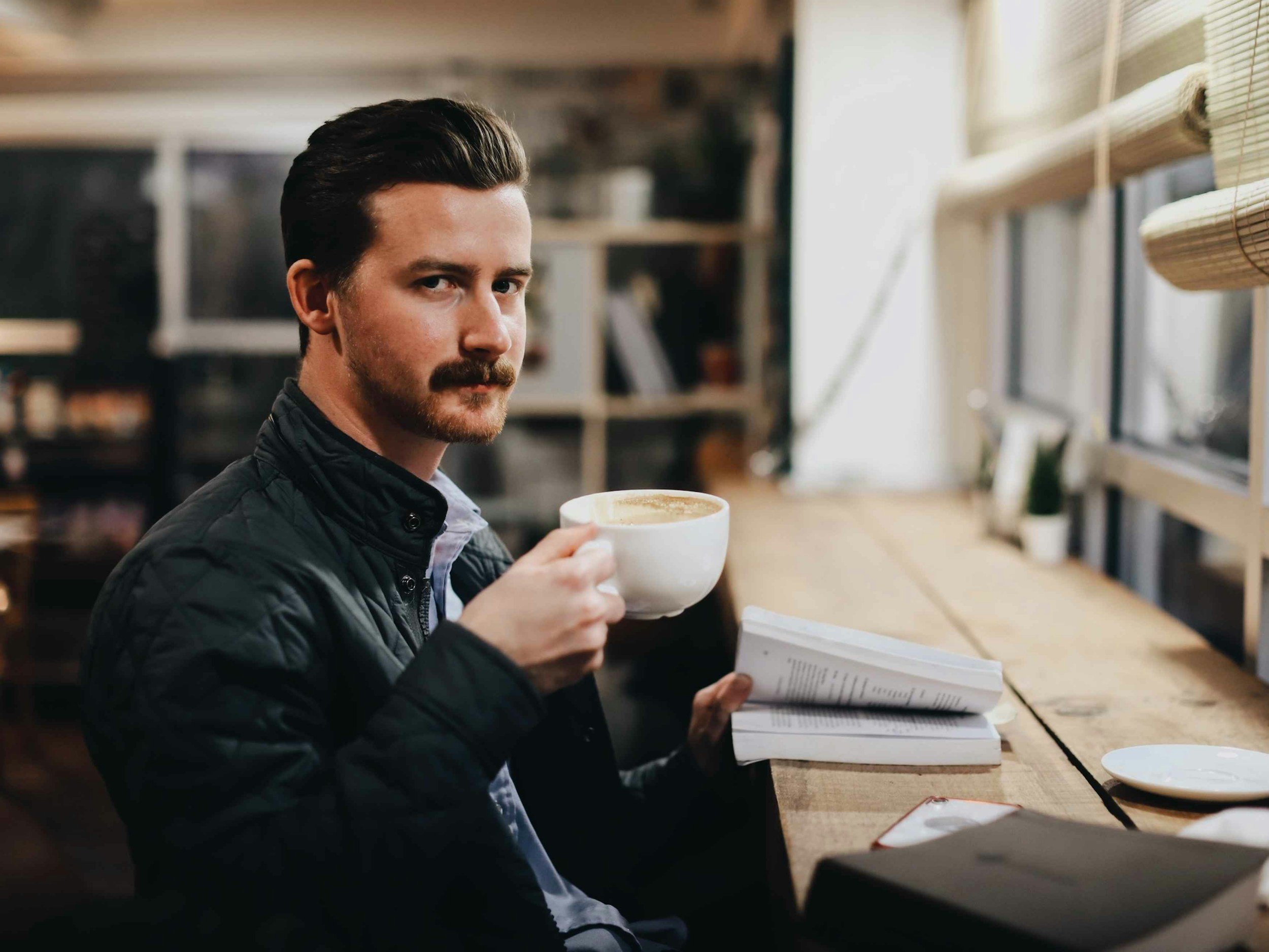 Paul with a cup of coffee