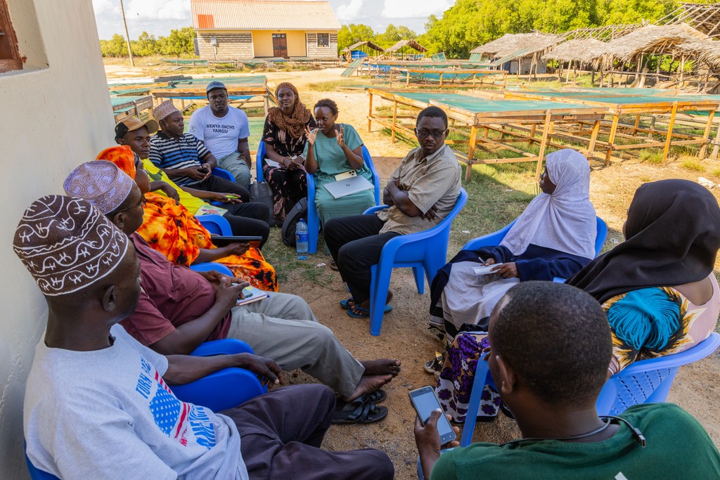 Lively discussion at community meeting. Photo credit Anthony Ochieng Onyango