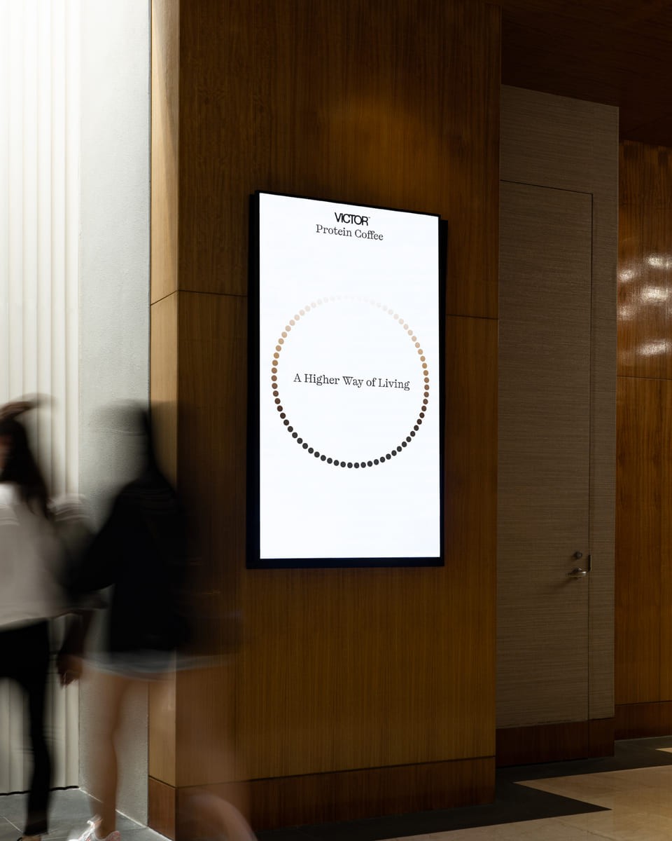 Photo of a billboard with a design inside a building.