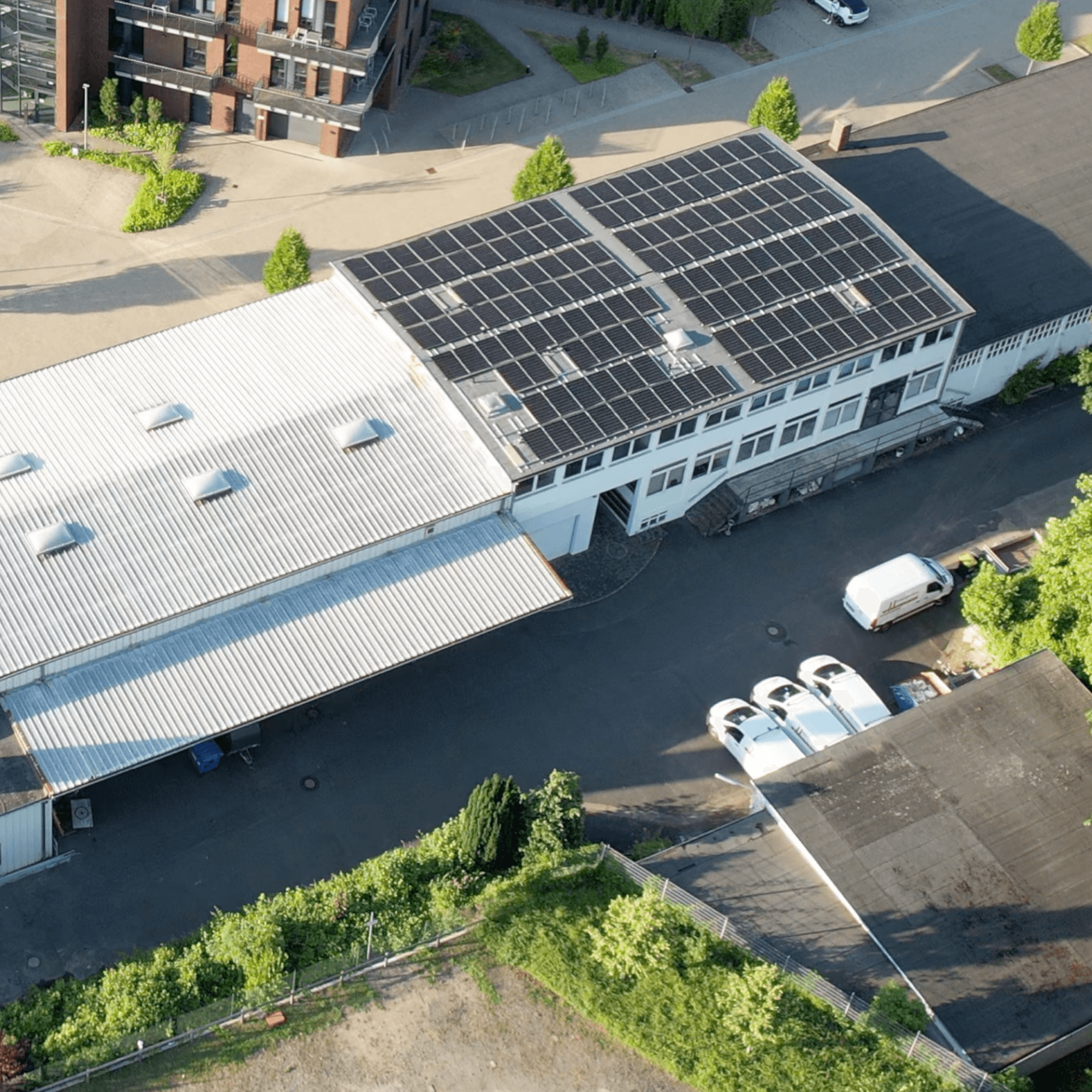 husband and wife working happily on a laptop