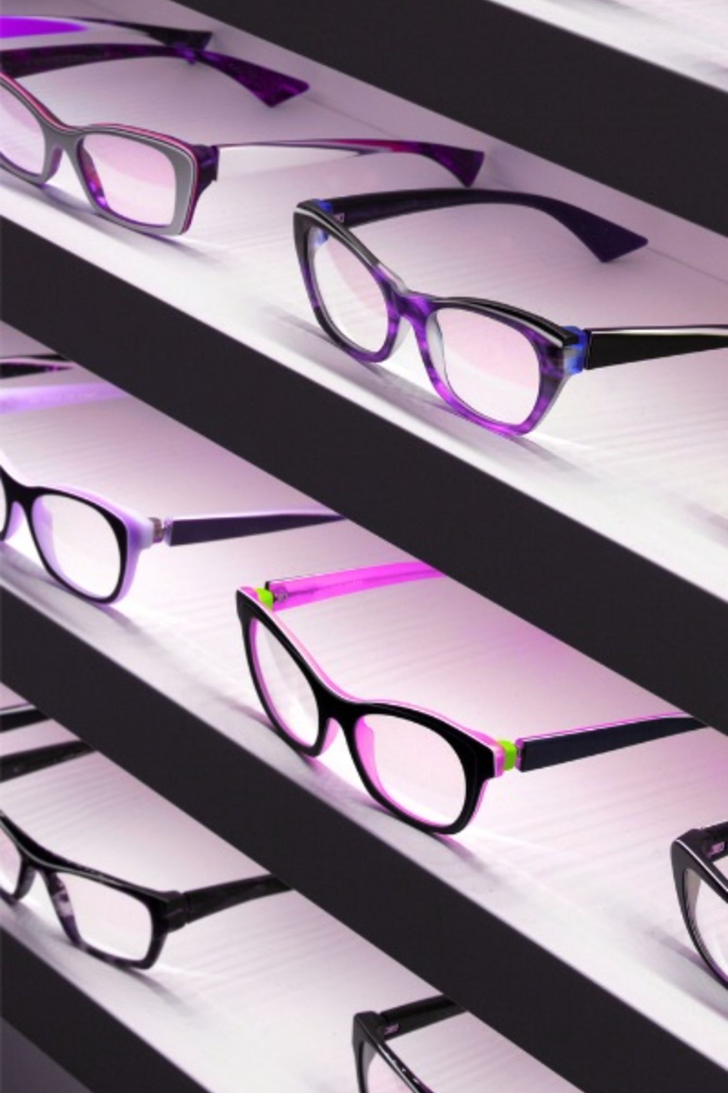 A stylish display of modern glasses frames in varied shapes and colours, showcasing how eyewear can express personality and elevate personal style with the right choice.