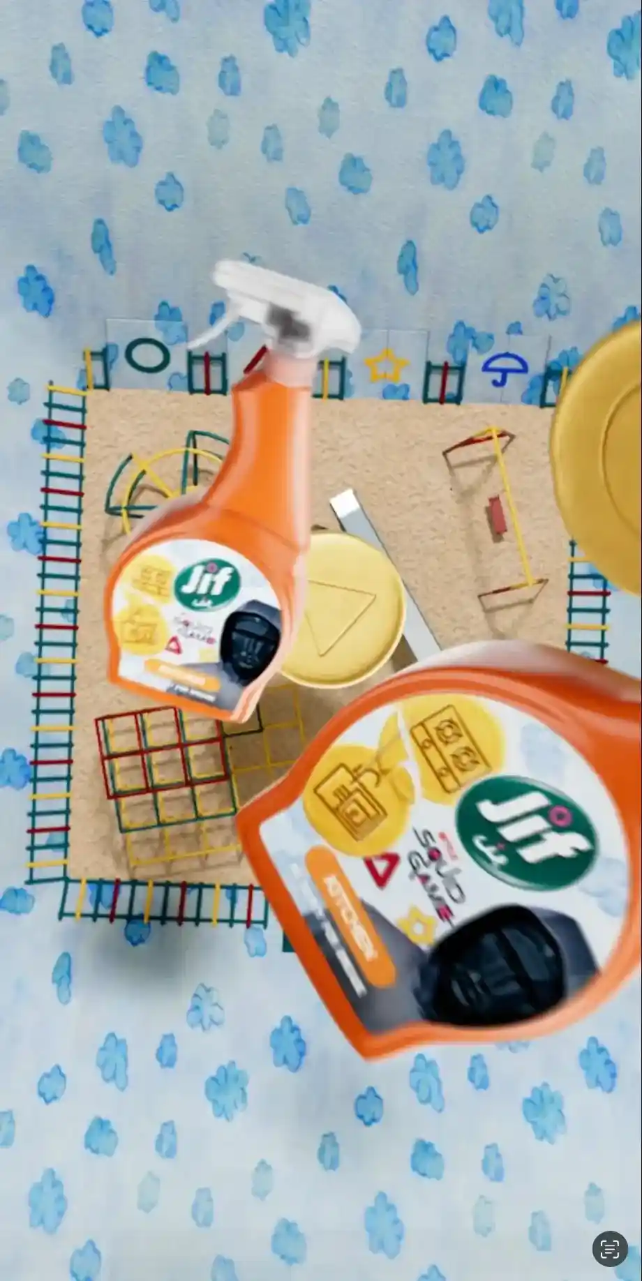 Orange Jif cleaning spray bottles float over a colorful playground themed after Squid Game
