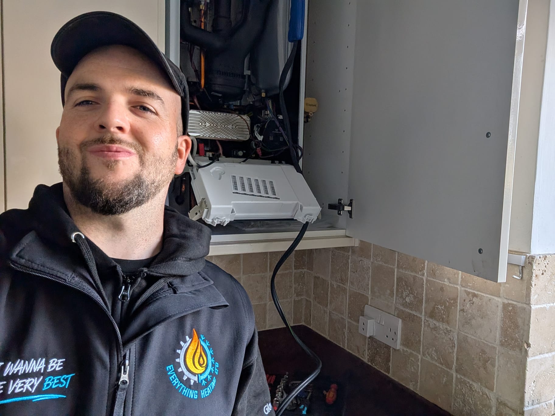 Everything Heating engineer inspecting a boiler in denham