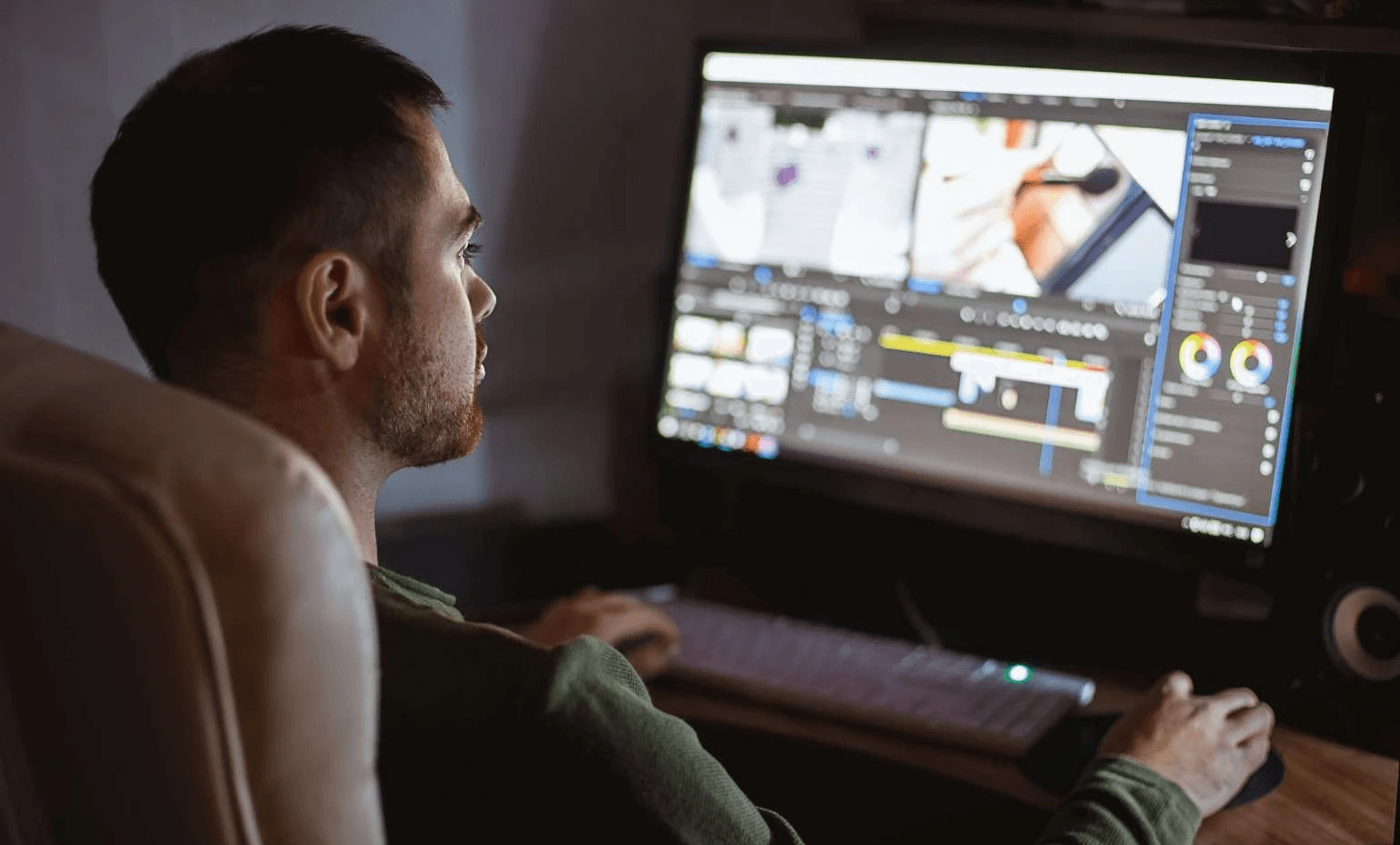 Man editing video on a computer - NVIDIA Video Search and Summarization