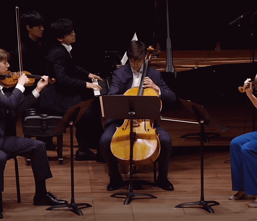 Pluckd Studio piano quartet performing at Lincoln Center as part of the Young Musicians Concert program.