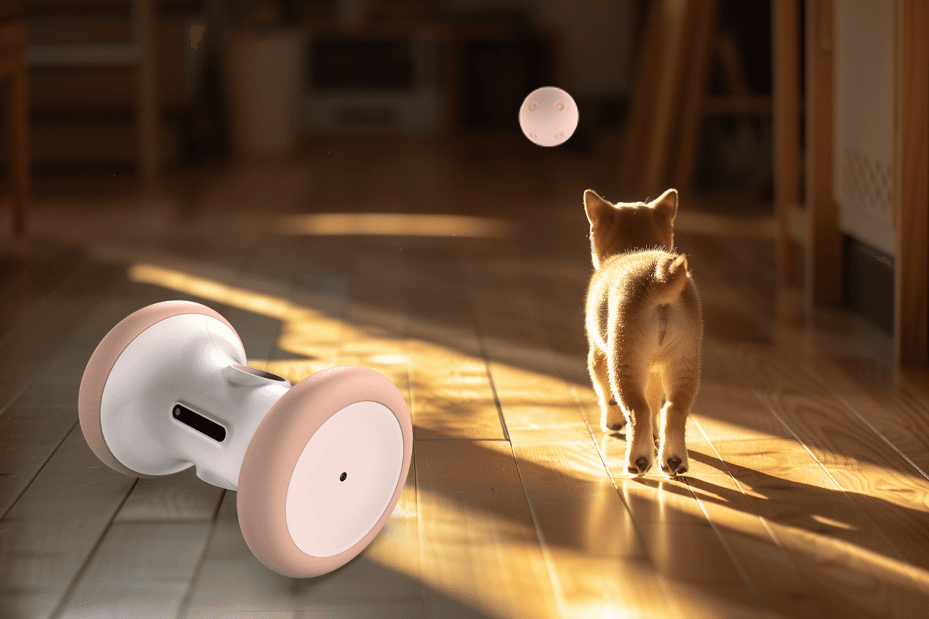 Close-up of hand holding pink ice cream cone against pastel background