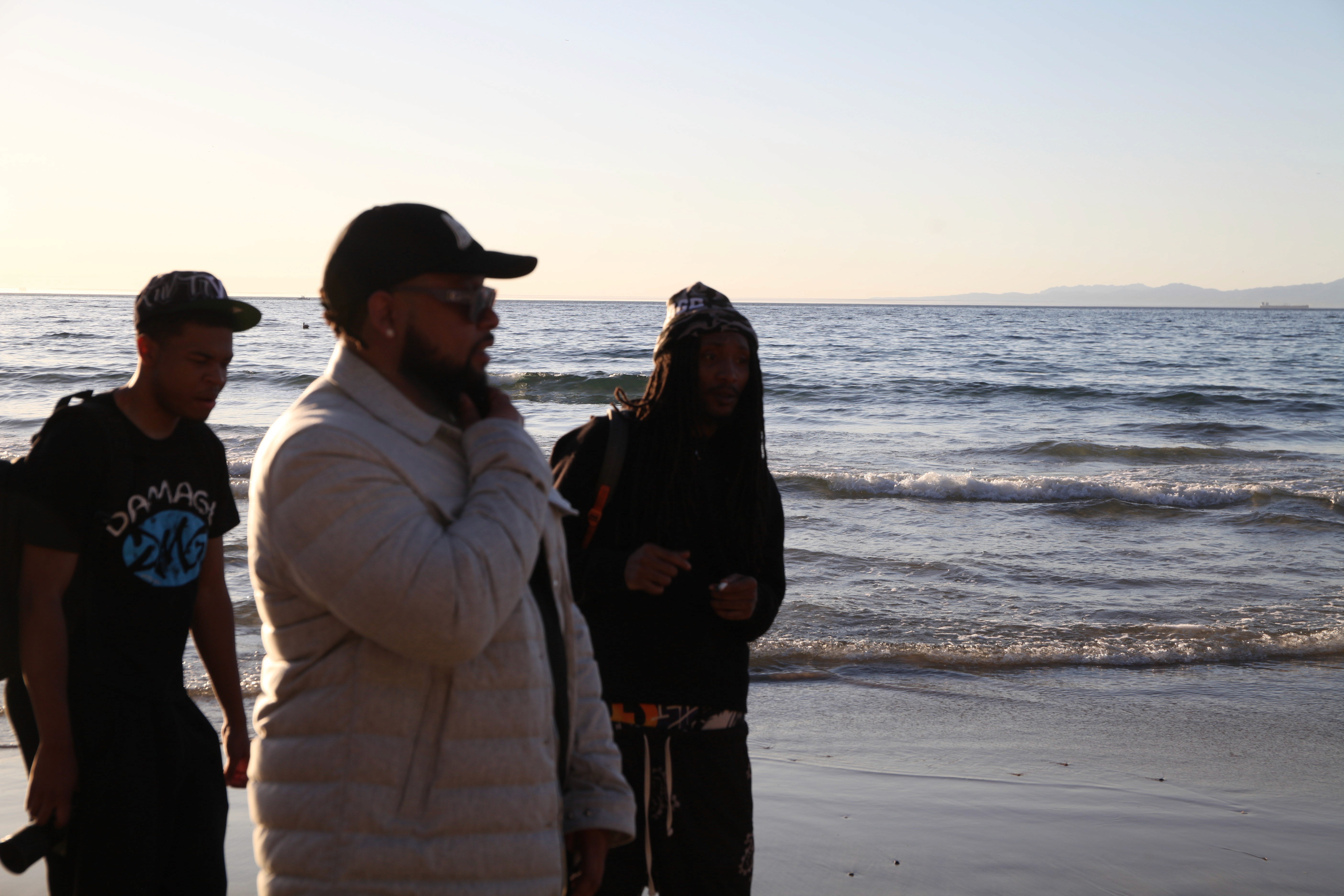 Performer under spotlight on dark stage