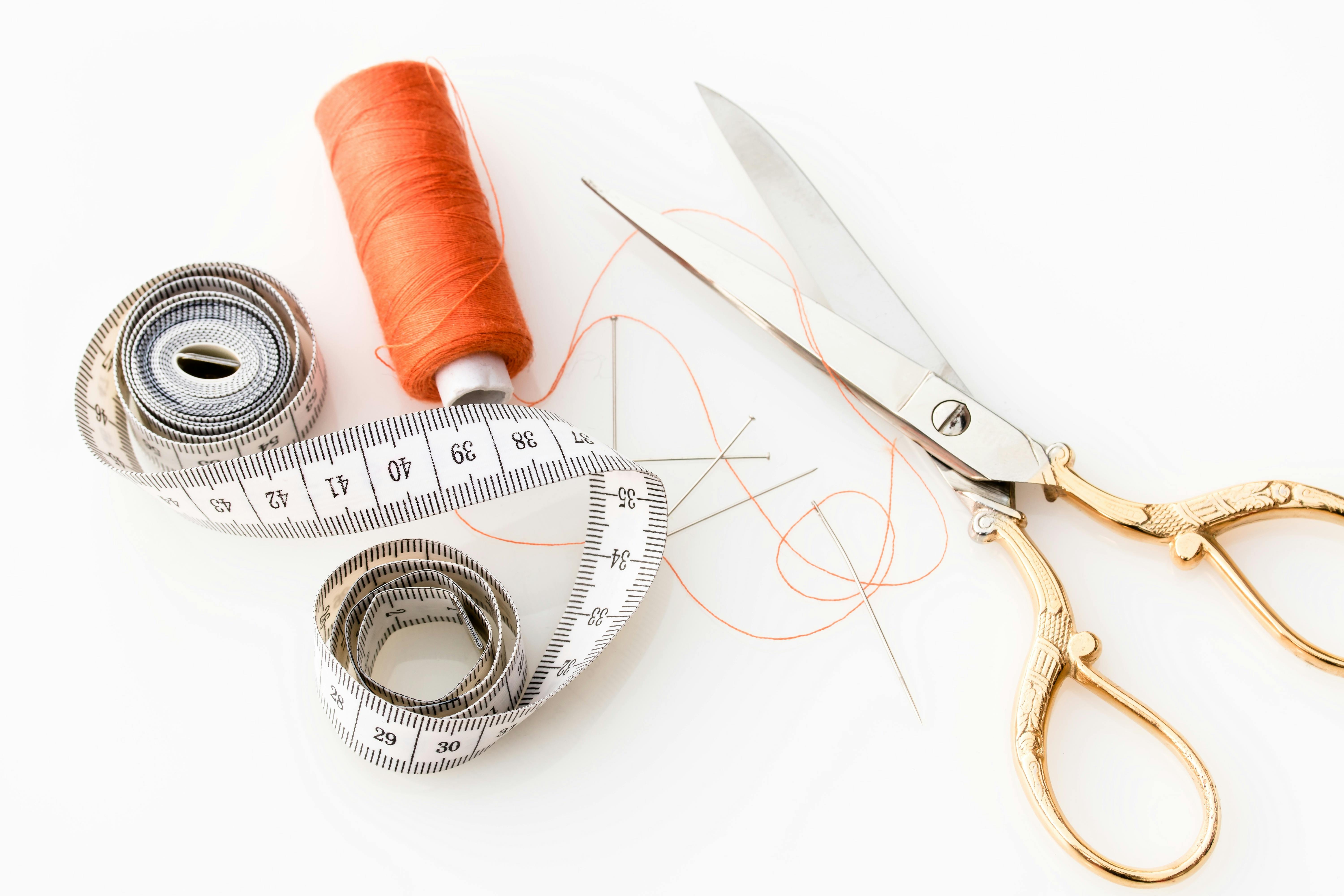 Scissors and sewing thread used to customize