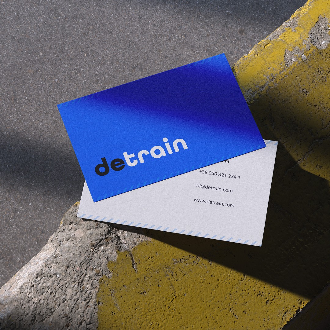 Modern home office setup with a monitor, ergonomic chair, keyboard, and indoor plants near a window with blinds.