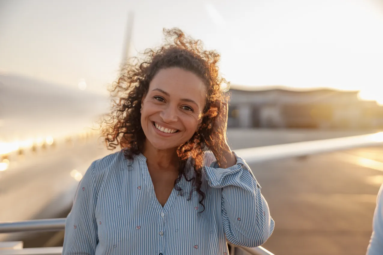 curly haired happy woman
