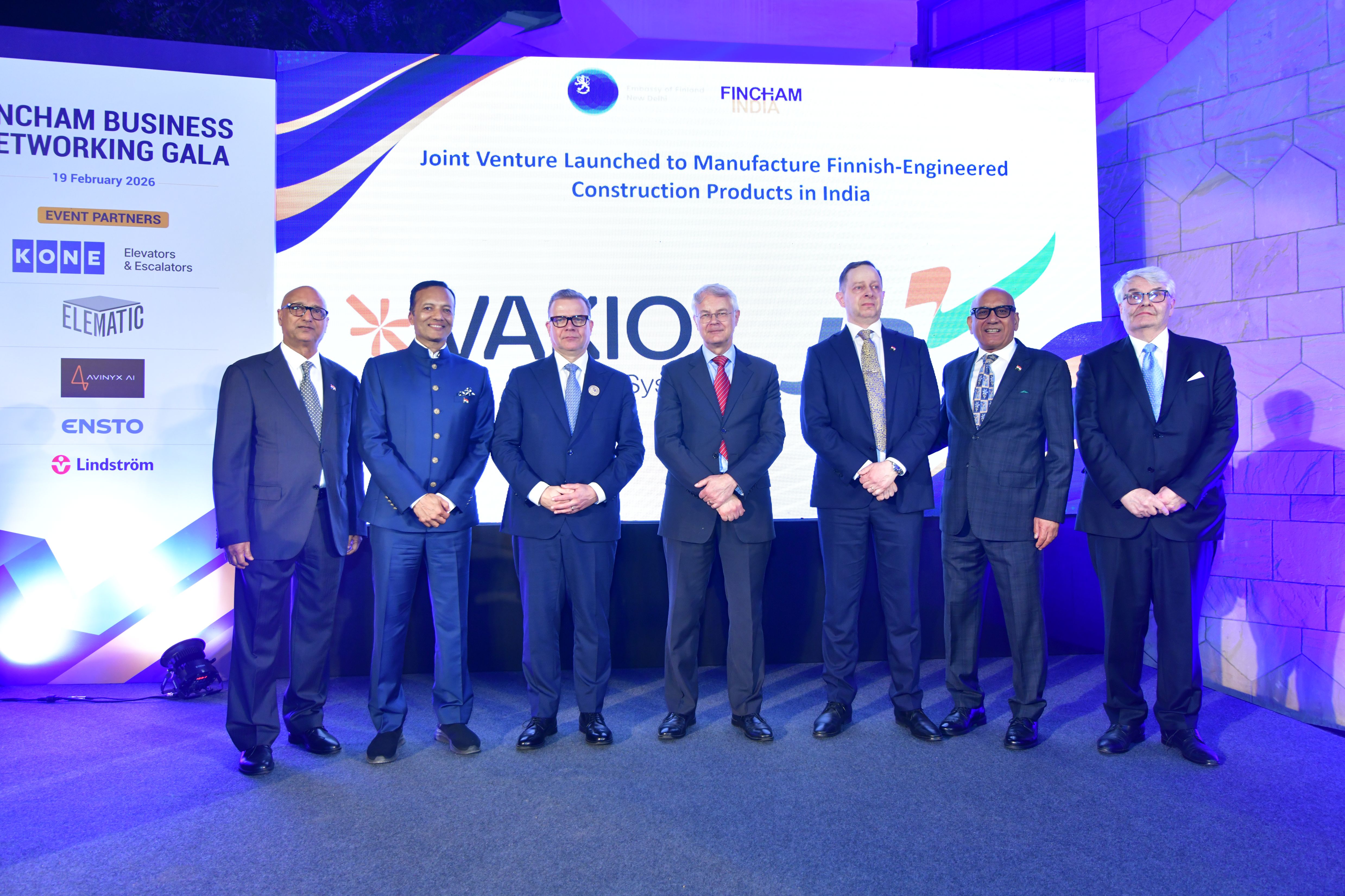 A picture of the companies' representatives on stage with Finland's Prime Minister Orpo and the Ambassador of Finland.