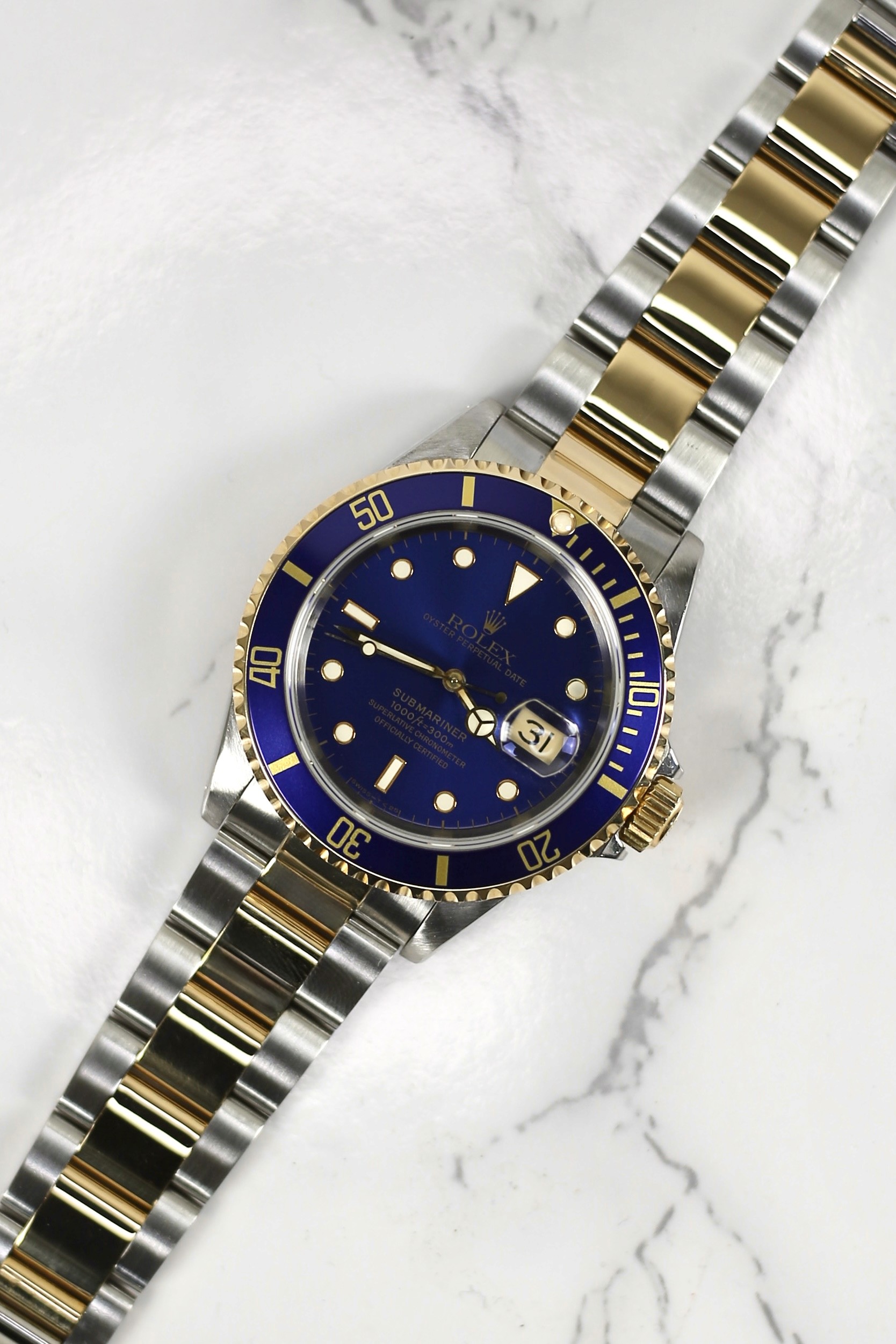 SUBMARINER DATE SUNBURST BLUE (STEEL & GOLD)