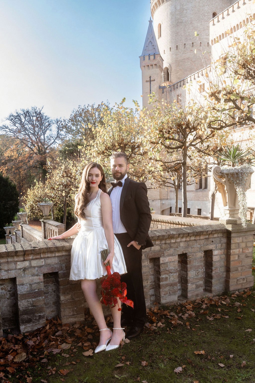 Photo of a couple outside at their wedding