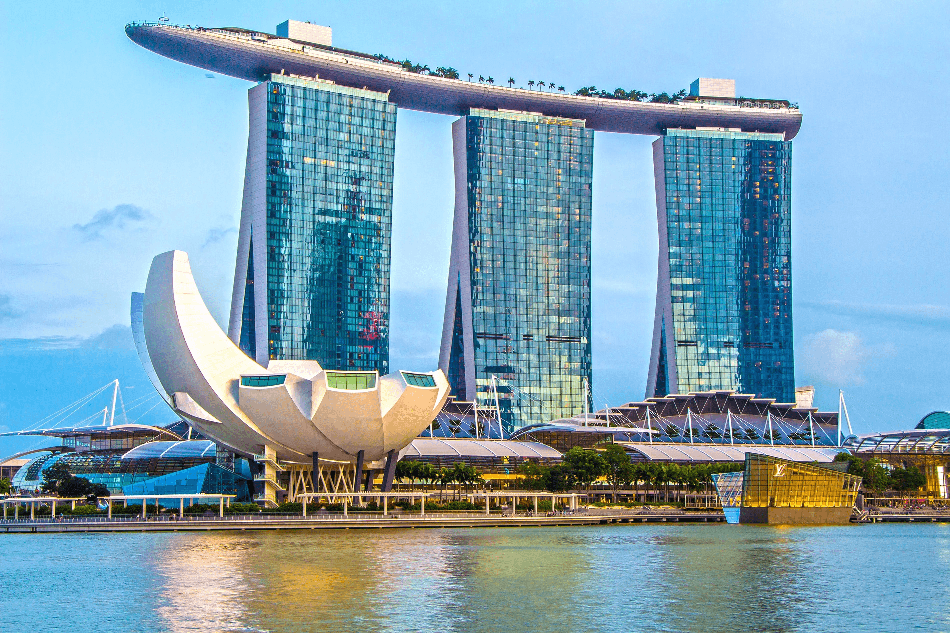 The image features the iconic Marina Bay Sands integrated resort in Singapore