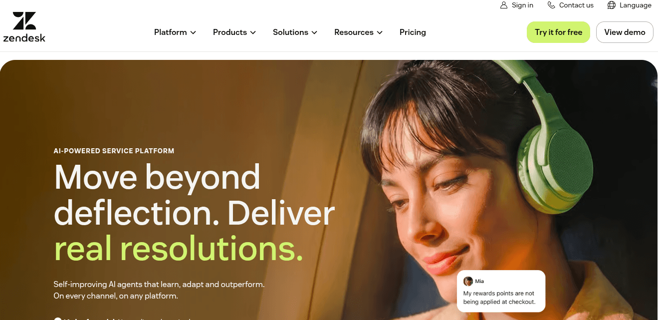 Zendesk homepage with headline 'Move beyond deflection. Deliver real resolutions,' describing self-improving AI agents across every channel and platform.