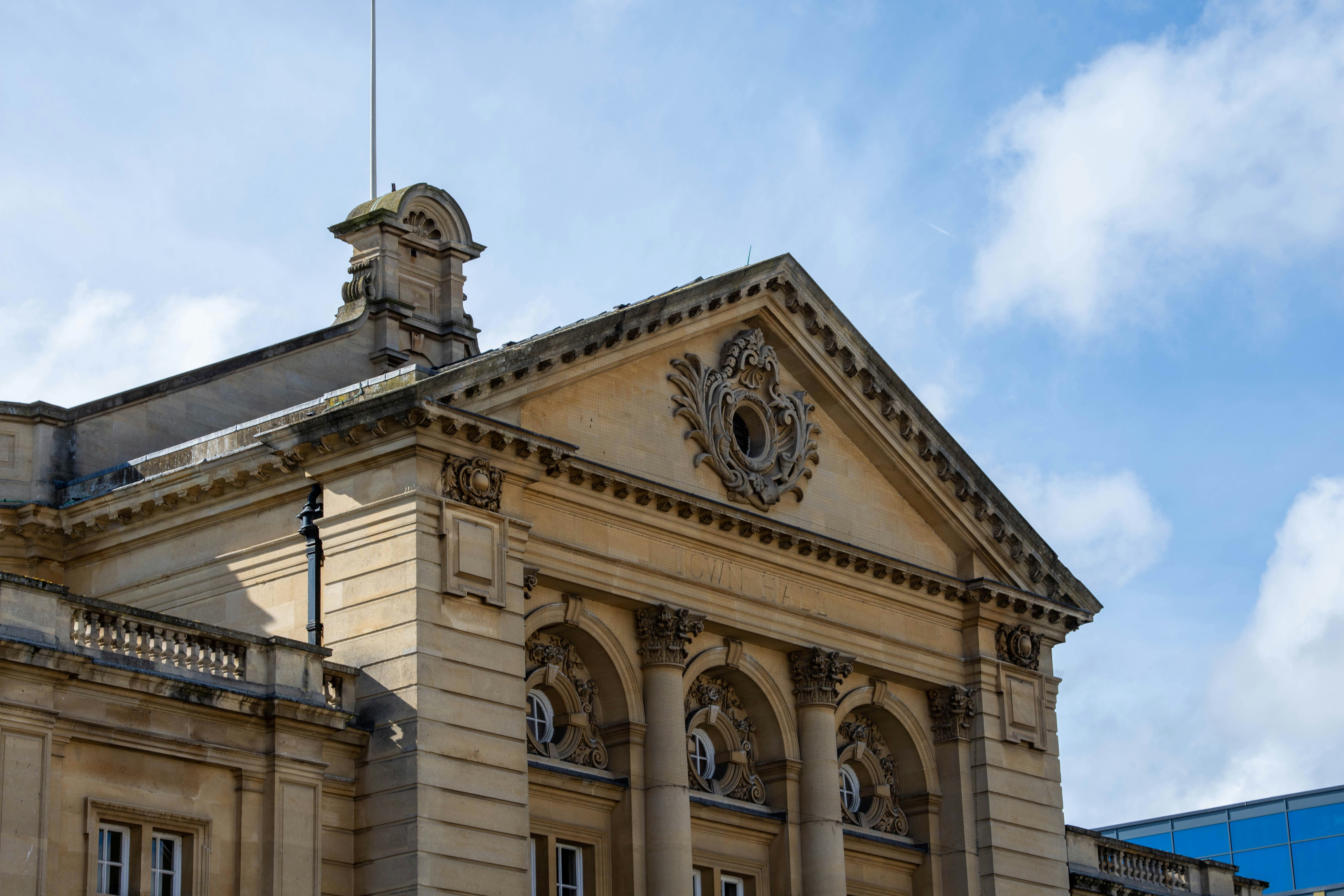 a large building with a clock on the top of it
