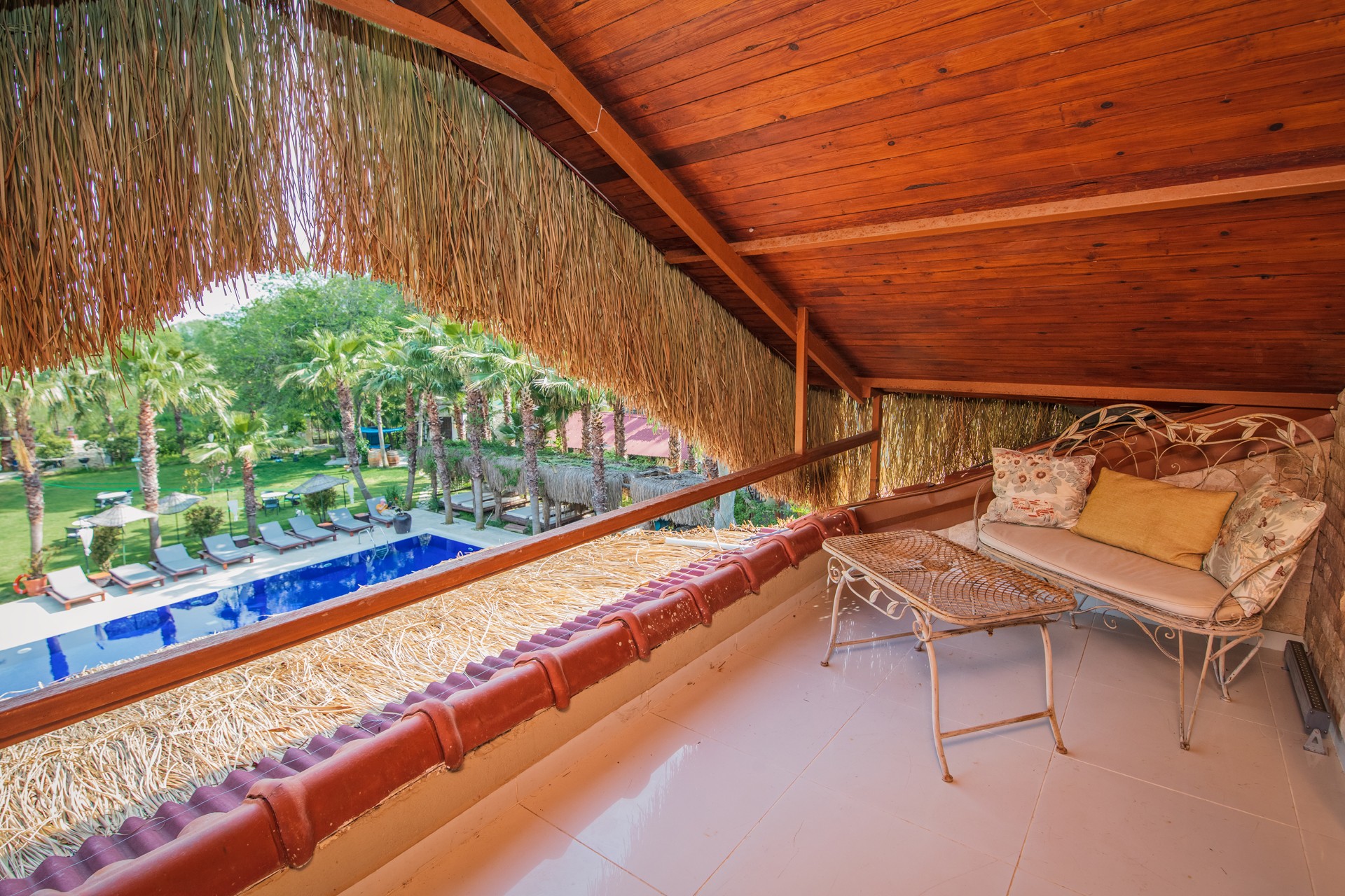 A luxurious penthouse suite in a coastal boutique hotel.