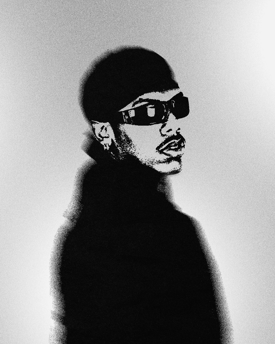 a blurry photo of a person standing in front of a wall