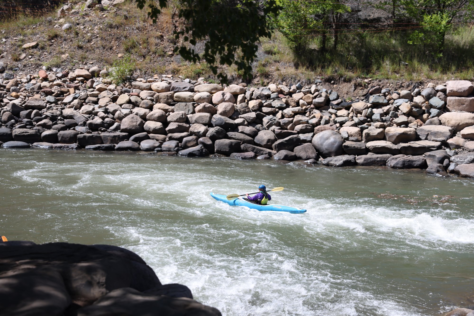 Kayaker paddling the Animas River