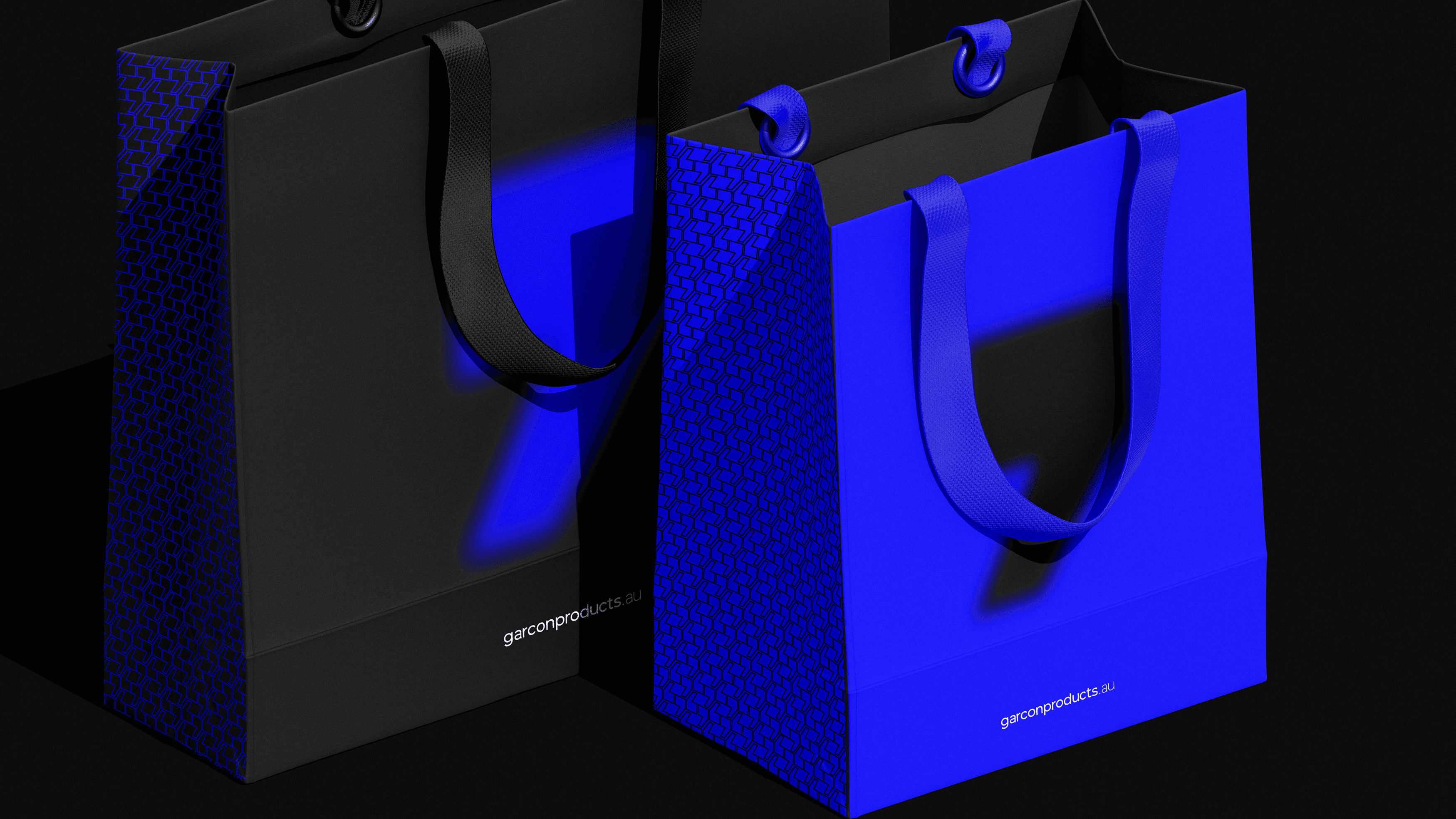 Person wearing black clothing carrying a black tote bag with a green globe-like geometric symbol, standing against a concrete wall in sunlight and shadow.