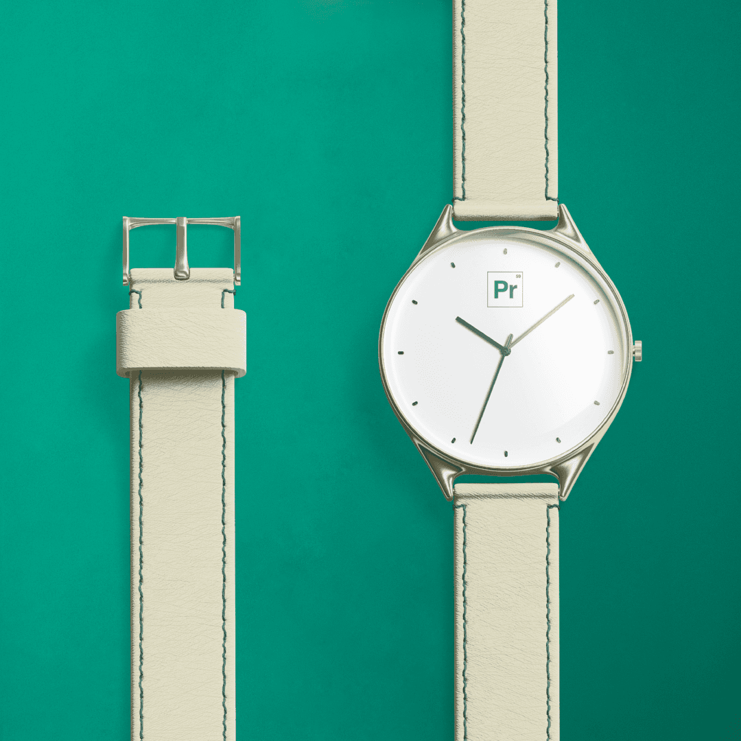 Minimal cream leather watch with white dial and "Pr" logo on a teal background.