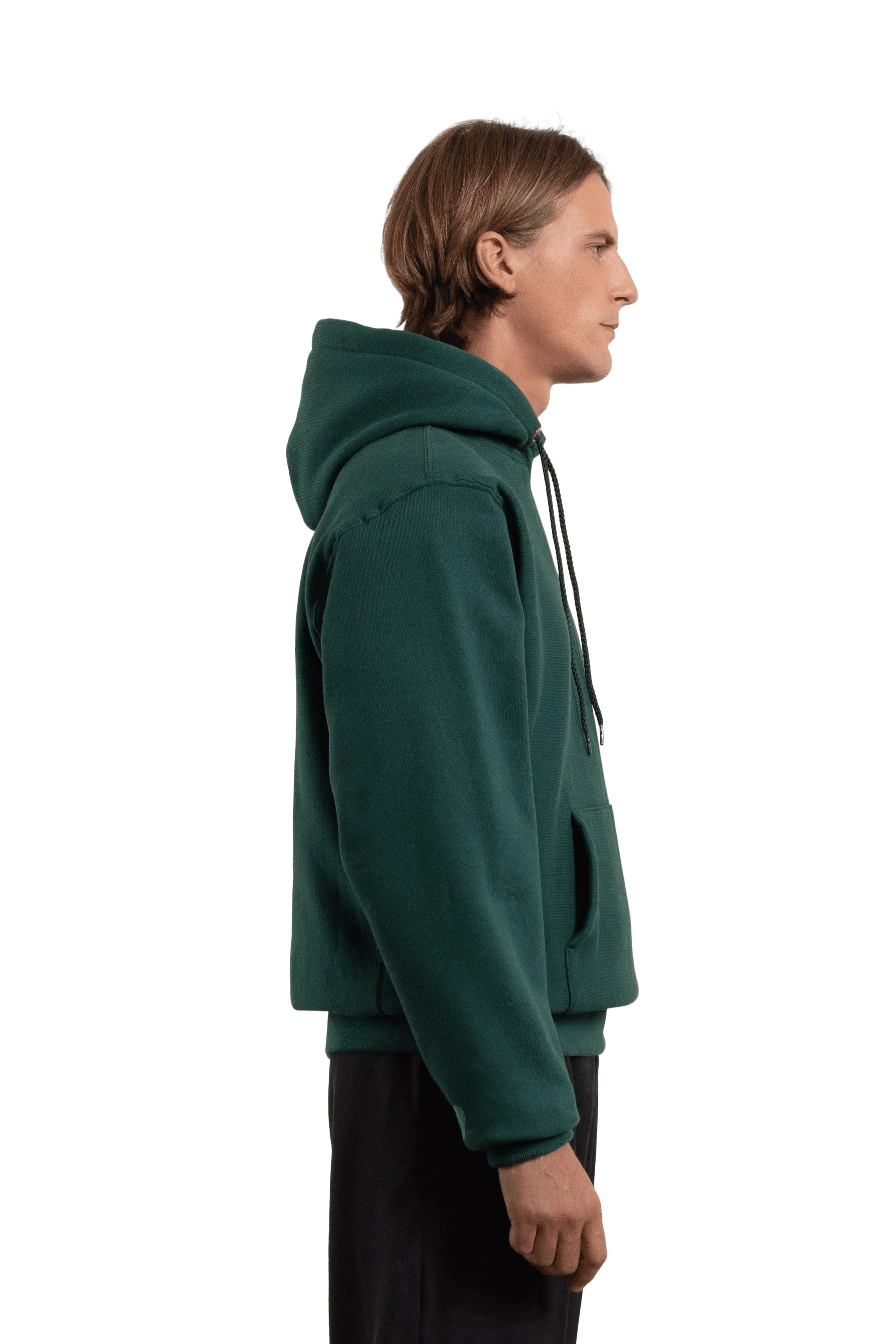 right side view of a model wearing a green hoodie