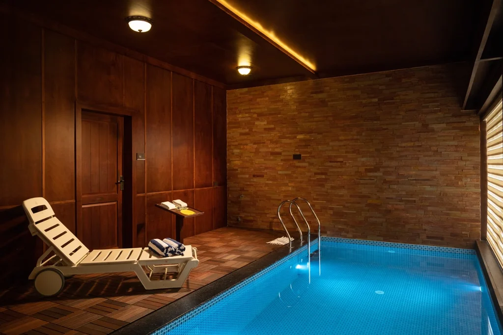 "Unwind in the exclusive indoor pool of our Premium Pool Villa at Au Revoir Wellness Resort – A perfect blend of luxury and serenity.