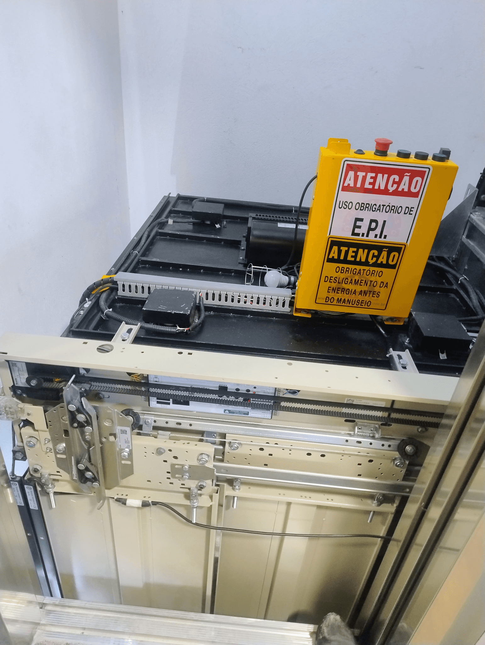 woman sitting around table holding tablet
