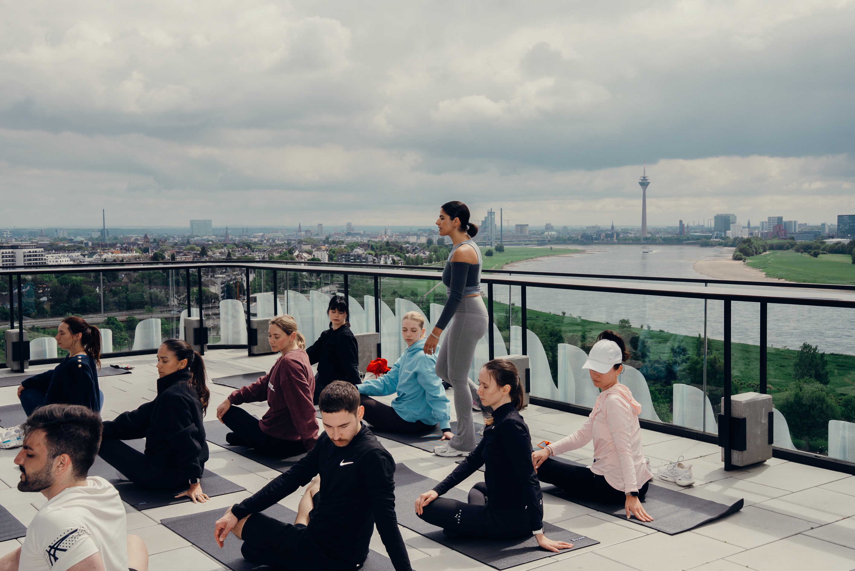 Woman in wedding dress while holding flower during daytime