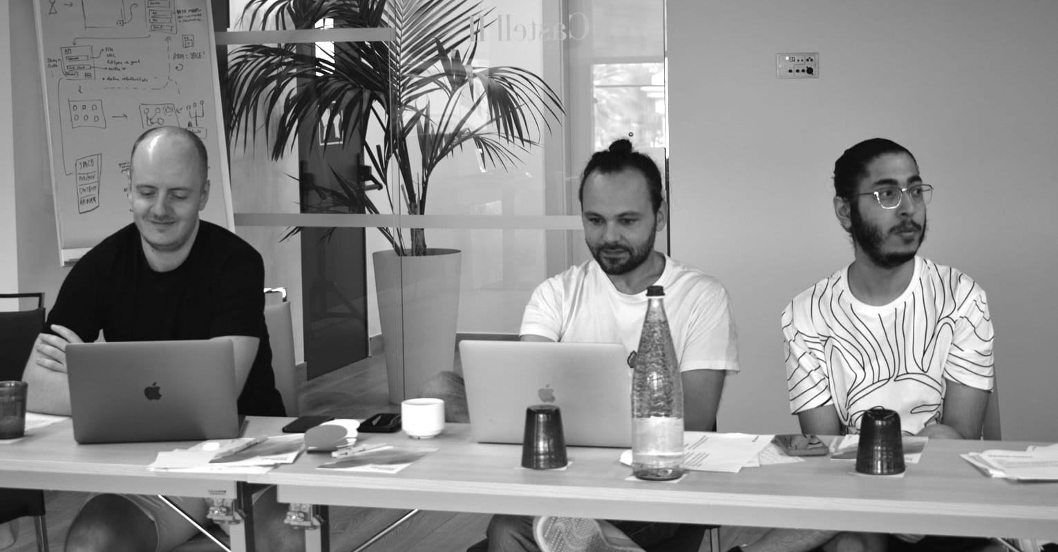 A photograph of a GitBook team member enjoying an espresso in a sunny environment