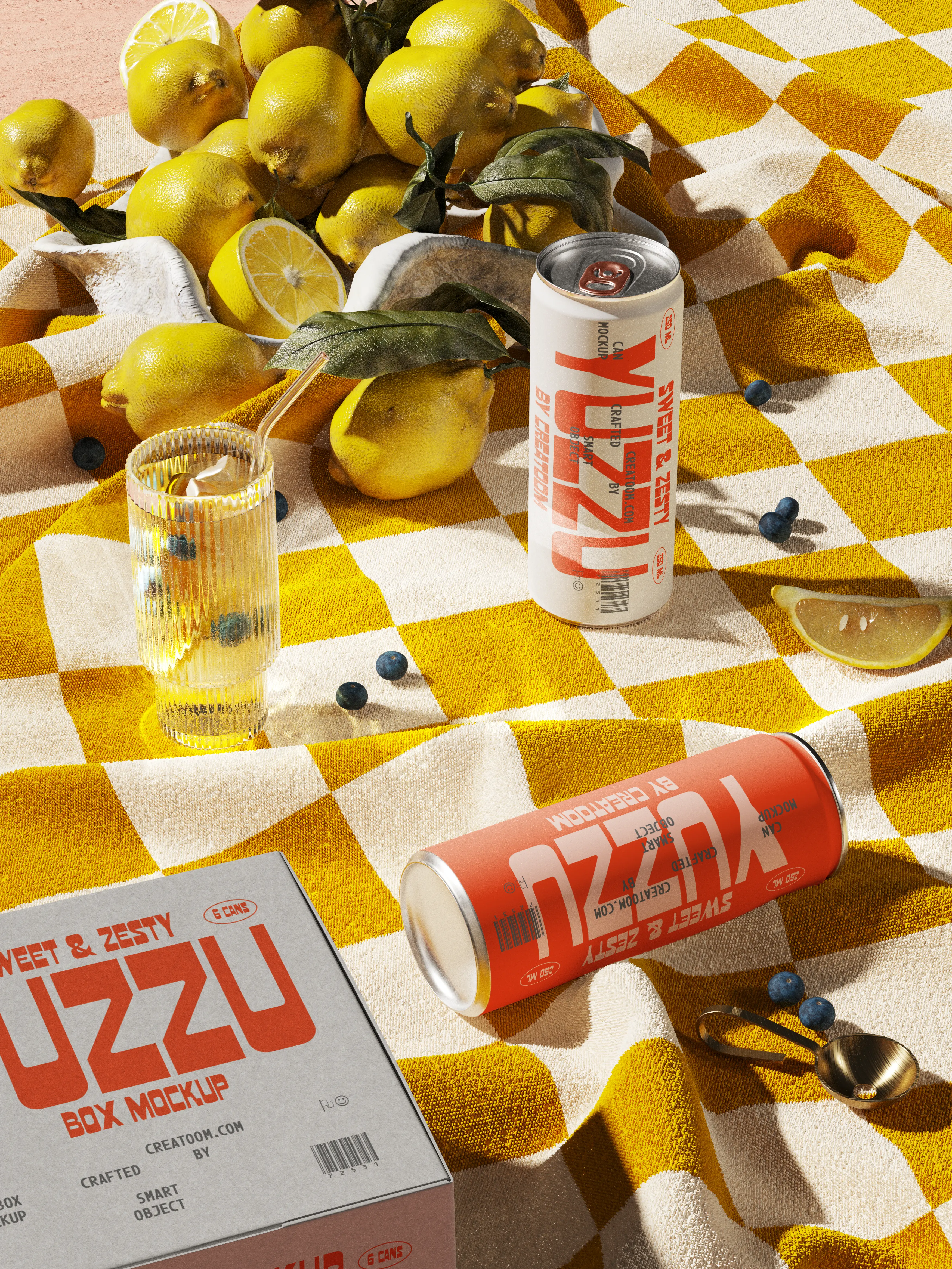 Yuzzu cans on a yellow checked picnic blanket with lemons