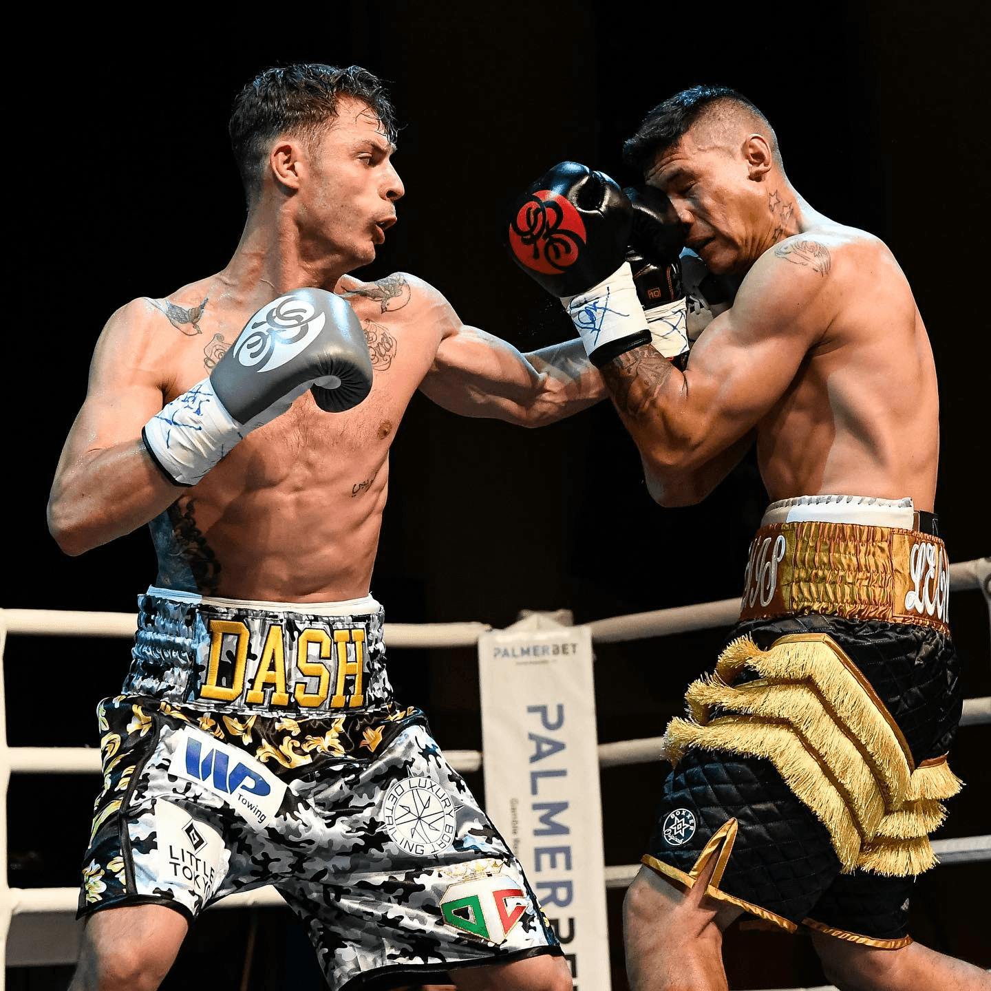 High-intensity boxing action with Danilo Dash Creati exchanging punches in a professional fight.