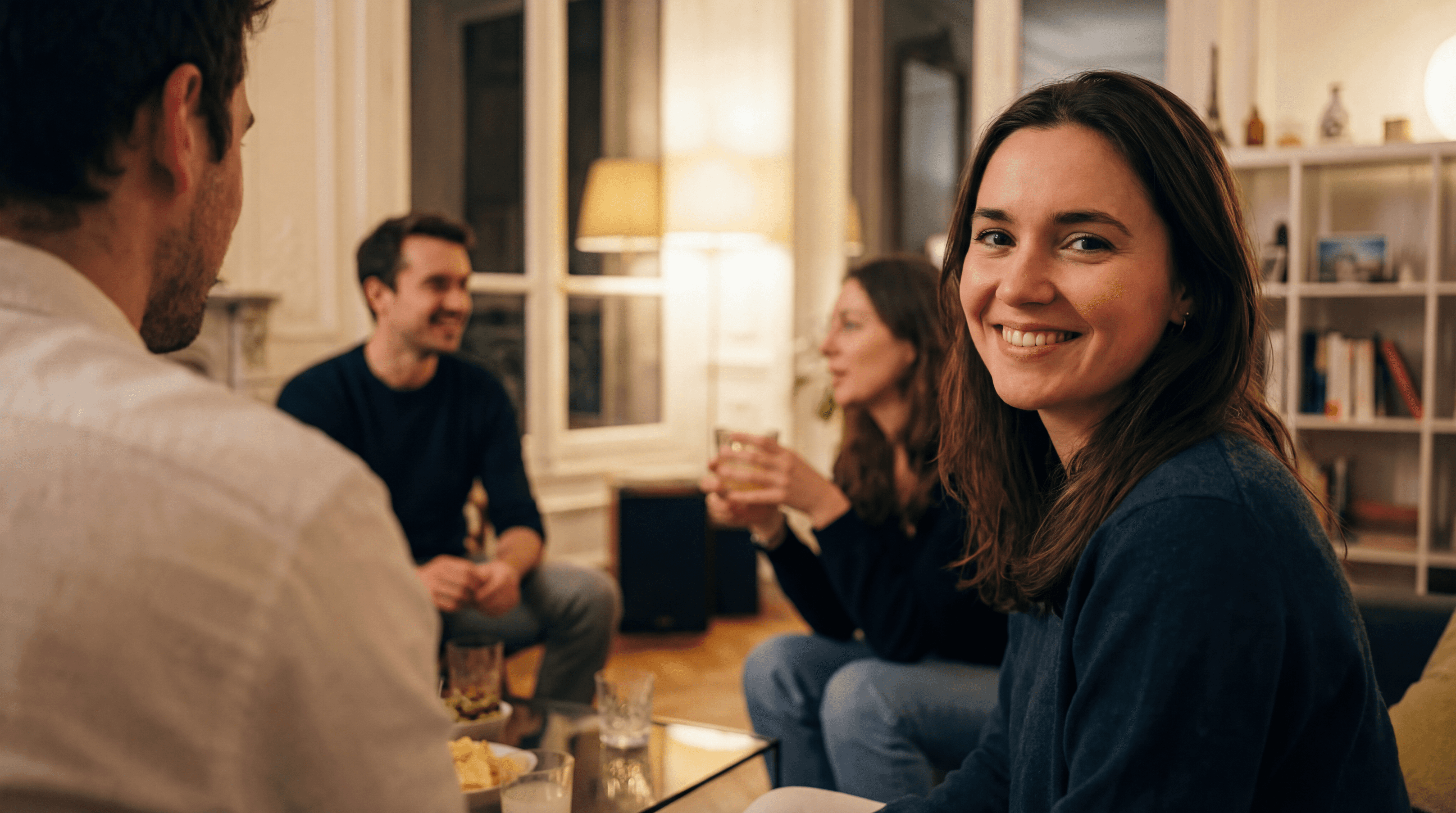 a group of children sitting on steps in front of a building