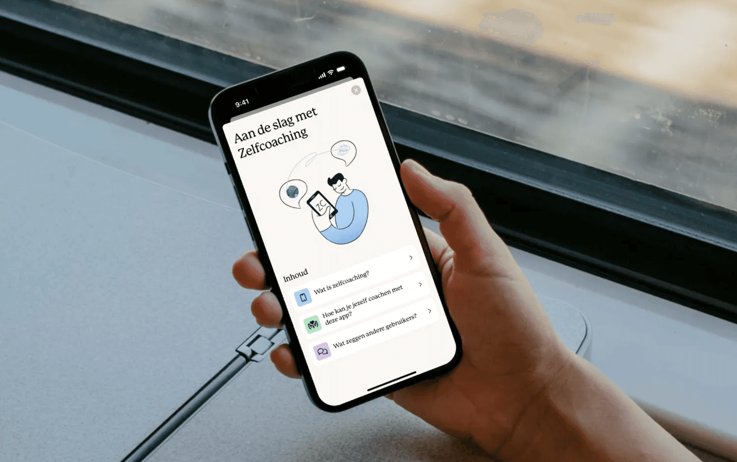 Person uses smartphone on train, app shows "Start your journey" with travel options.