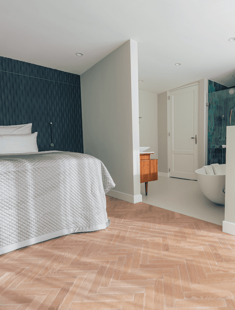 Sage green walls bedroom with lilac duvet and modern style