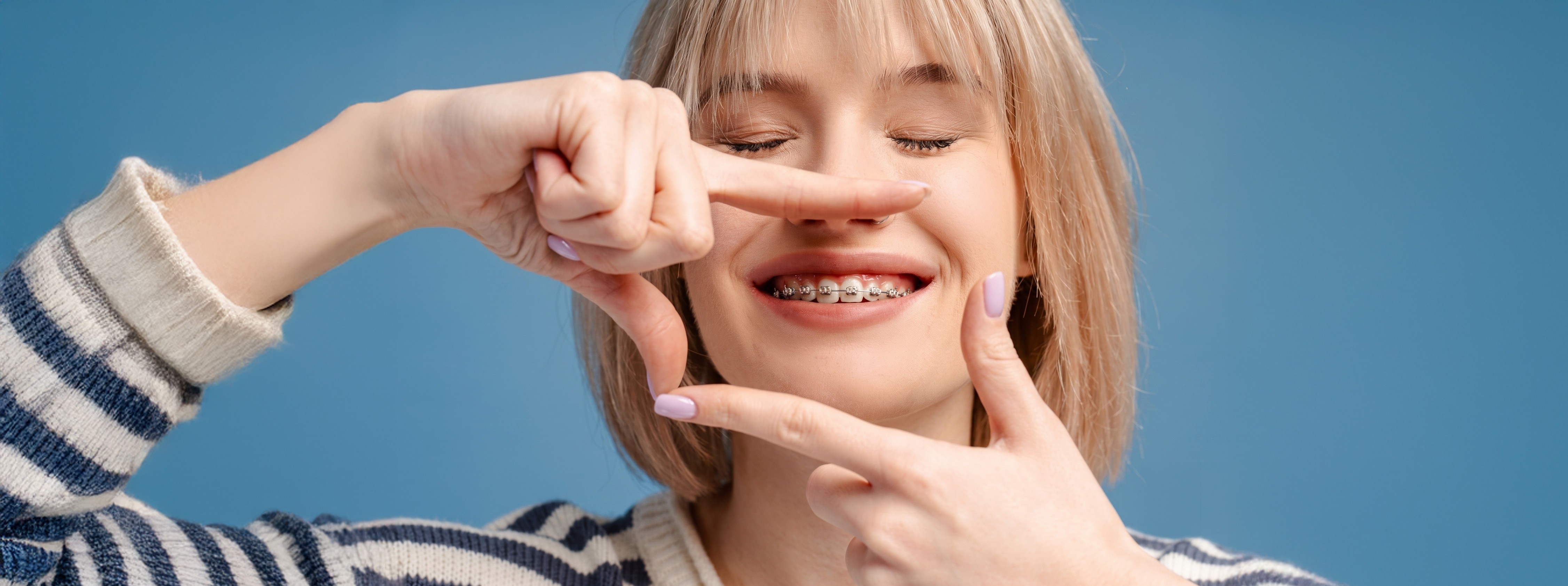 dentist examining patient with dental scanner
