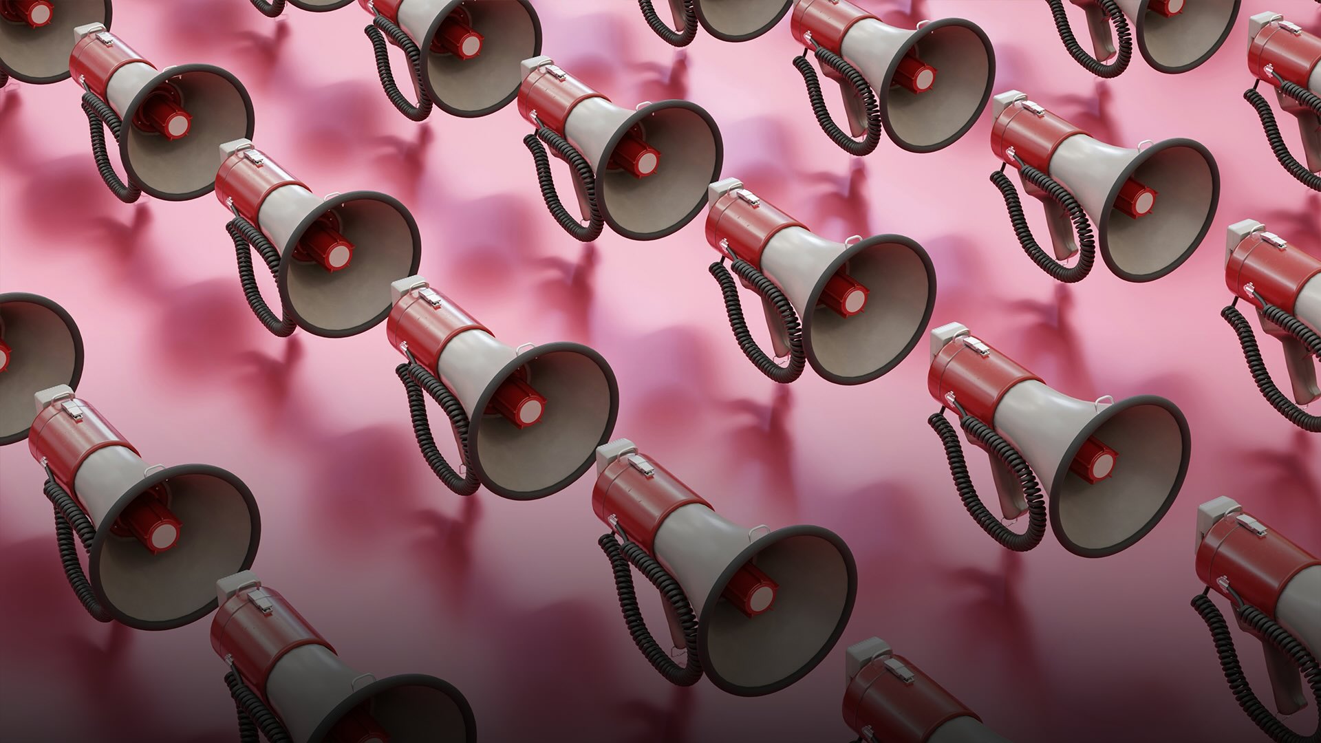 an array of bullhorns on a pink background