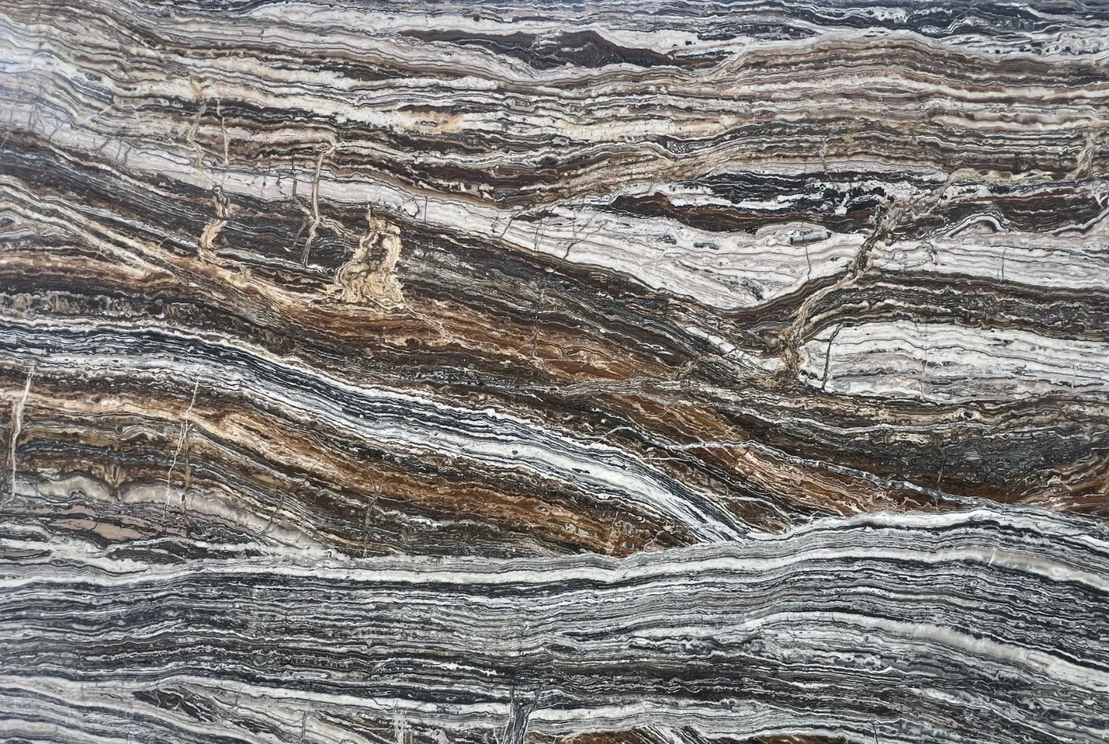 Jurassic vein-cut filled travertine slab on the workshop floor